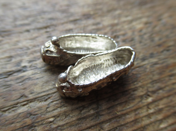 Vanha amuletti: kotitossut
